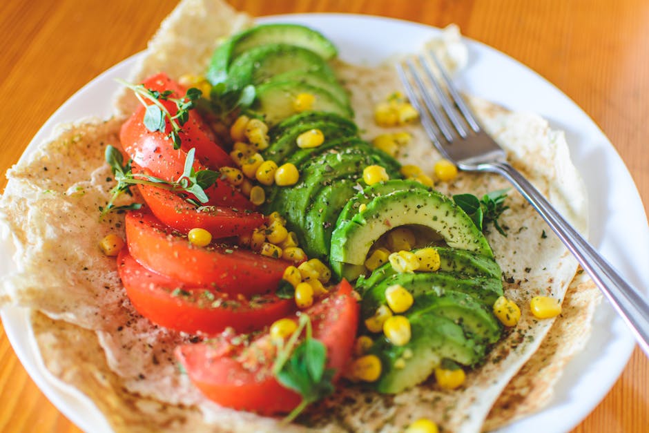 Two plates side by side — both filled with vegetables, grains, and legumes