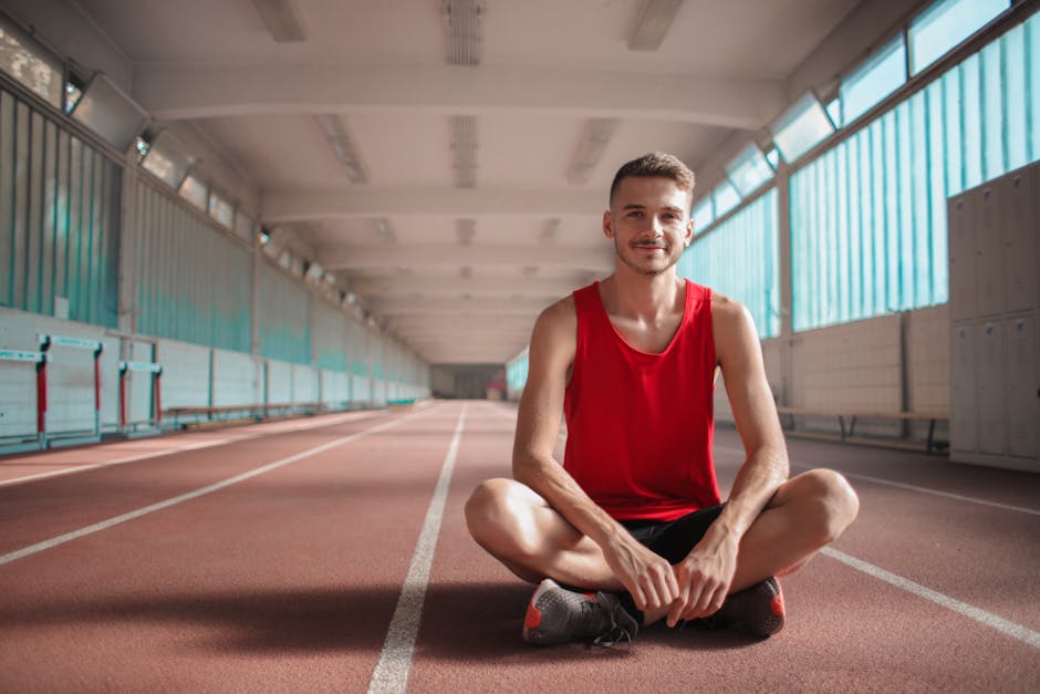 Athlete with plant-based meal — bowl of grains, legumes, vegetables, and protein shake